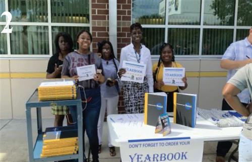 yearbook staff pose for a picture during club & activity day 